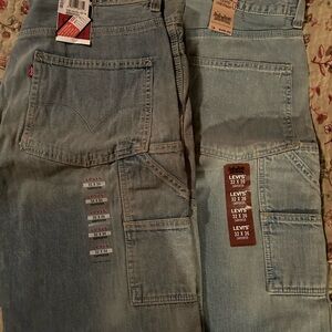 Men’s Levies Carpenter jeans with tags. 
1 pair 32x34
1 pair 32x36